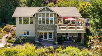 Stunning exterior with cedar shingles & great outdoor hangout spots!