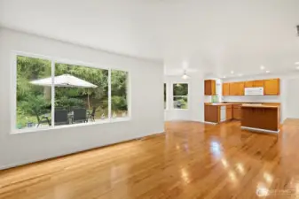 Looking towards the kitchen area and a glimpse of hte backyard deck.