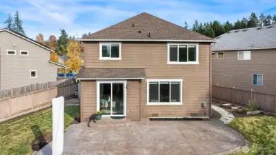 Expansive patio os perfect for entertaining, whether dining alfresco or snuggling up around a fire pit.