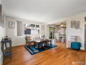 The unit has laminate flooring and the spacious living room gives you many options for furniture placement.