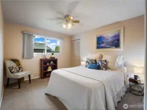 The bedroom has a narrow walk in closet.