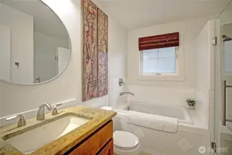 Top floor full bath. Slab granite counter-top.