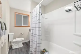 Main bath is spacious and updated.
