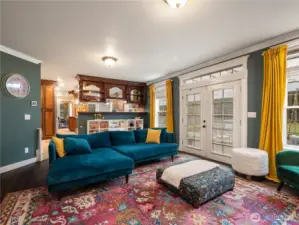 large living area looking back into kitchen area