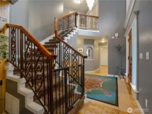 main staircase leading to upstairs bedrooms