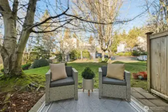 Outdoor living is just as enjoyable as the interior. Step out to your private backyard patio! The patio opens directly to a lush, open common lawn area, offering peaceful green views and a sense of space rarely found in townhome living. It’s a serene backdrop that brings nature right to your door.