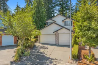 Striking Curb appeal, oversized 3rd garage bay.