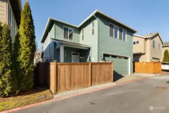 fully fenced and extra parking in front of garage