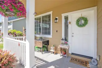 The covered front porch offers the perfect spot to sit back and relax.