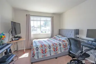 Enjoy the added comfort of Guest Suite #2, where natural light fills the space with warmth.