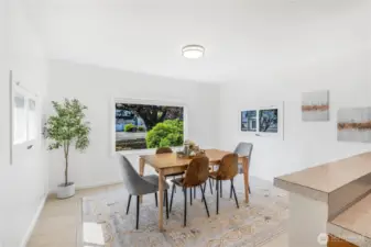 Spacious dining room with direct access to the kitchen.