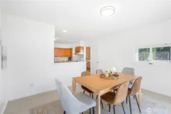 Room for a huge table and china hutch in dining room.
