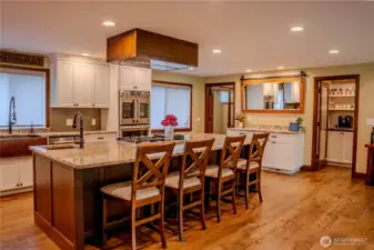 On the back wall is the extra finished room on the left and walk-in pantry on the right.