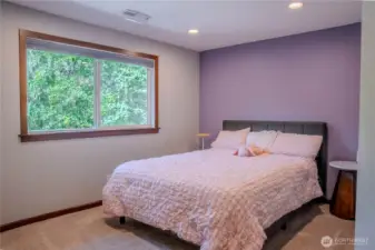 Another large secondary bedroom-queen size shown here