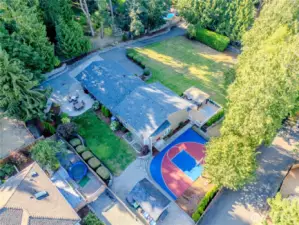 Aerial view of home, drive up and most of the yard