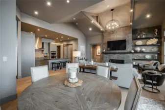 Dining area looking into the kitchen and living room.