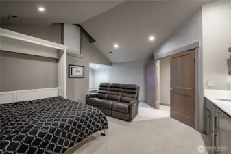 Upstairs Bedroom with ensuite, murphy bed, tv area with mini bar for your guests.