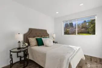 One of two additional upper level bedrooms