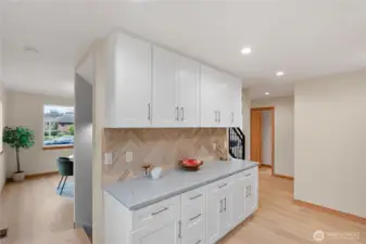 Easy flow from dining, to kitchen, to living.