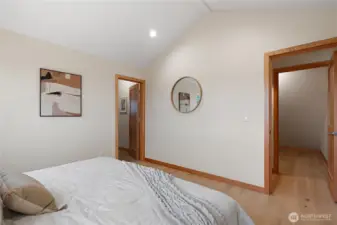 Across the hall from the primary suite is a large closet or bonus space.