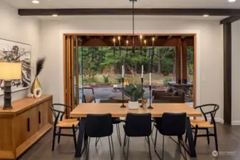 Through warmer months dual folding doors in the living and dining spaces transform the main level into an indoor/outdoor haven.