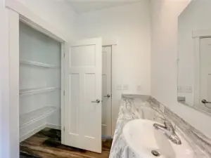 Large closet space for linens and additional storage.