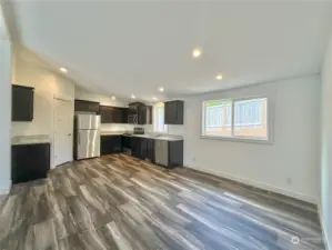 Open concept kitchen with tons of space and large pantry.