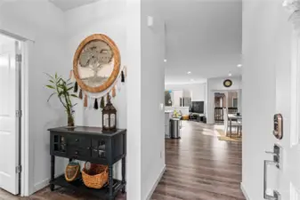 Upper level entry with vinyl plank flooring that flows throughout the main living areas.