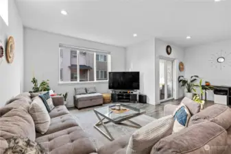 A slider off the living and dining area leads to the covered balcony.