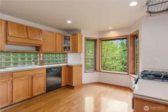 Oak cabinets.  Ample counter space for food prep. Lots of storage in kitchen and throughout house.