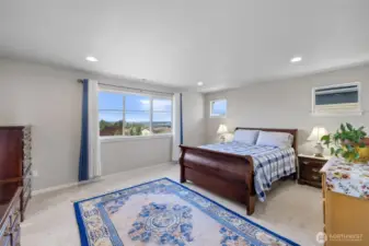 Primary bedroom with views of the sound & river.