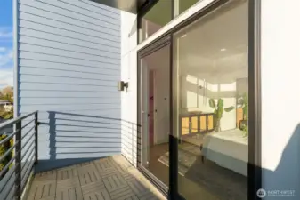 Primary Suite Balcony is the perfect spot to serenely start and/or end your days.  Photos are staged model of same floorplan.  Color schemes may vary.