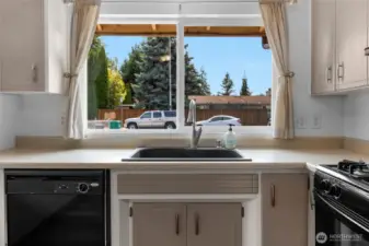 Open Kitchen with big bay window