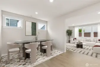 Spacious dining room on main off family room.  Photo is representational. Actual home is under construction and finishes and colors will vary. See site agent for details.