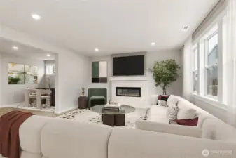 Spacious family room with cozy fireplace