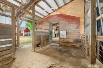 Through the workshop access to covered stalls. Barn/Hay access to the right.