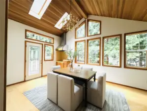 Skylights, vaulted ceiling, a great room to host a party, so very NW style