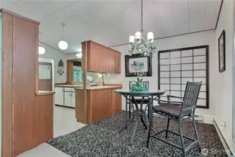 The dining area is conveniently located next to the kitchen.  The din