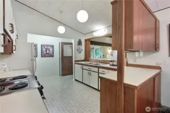 The vaulted ceilings in the kitchen, as well as being open to the dining area provides a spacious feeling.