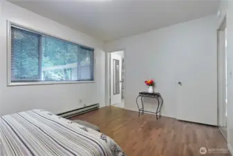 Another bedroom with hardwood floors.