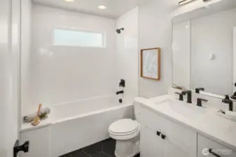 Full bathroom next to second bedroom.