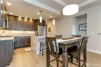 Elegant kitchen with quartz counters ready for your next dinner party
