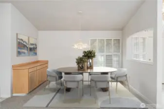 Dining room expands of of the great room. virtually stagedwith built in Buffet.