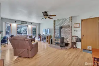 Family area with a second woodstove, ensuring warmth and comfort for everyone.