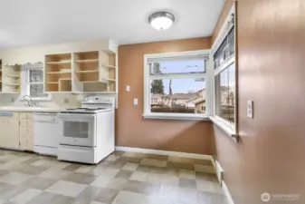 Kitchen Nook eating area faces East for lovely mountain views!