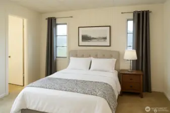 The main bedroom includes a full bathroom complete with ample storage for convenience and organization. (storage is not seen in this picture.) VIRTUALLY STAGED