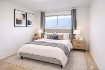 Bedroom three features beautiful lake views, carpeting, and an abundance of natural light throughout. A queen size bed fits perfectly here. with ample closet. VIRTUALLY STAGED