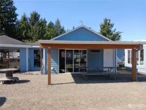 Covered area in front of guest kitchen and dining area.