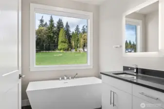 Actual primary suite with verdant views towards protected meadowlands.
