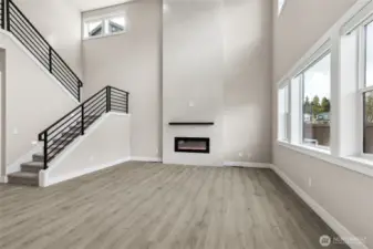 Dramatic fireplace with tile surround is a designers dream!